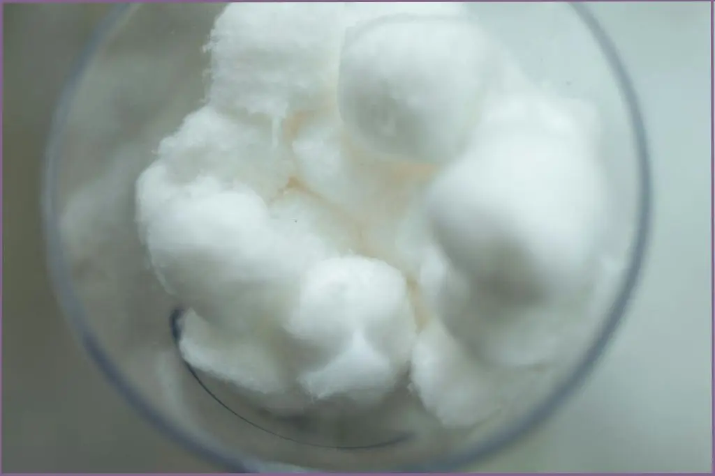 cotton balls in a bowl scented with essential oils used as natural closet fresheners with essential oils