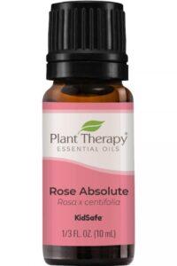 bottle of rose essential oil