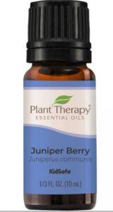 bottle of juniper berry essential oil