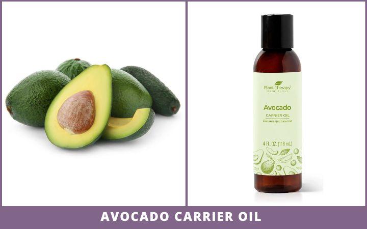 Avocado fruit and bottle of avocado carrier oil