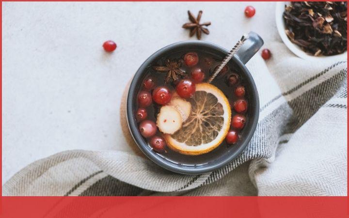 simmer pot with cranberries, orange slices, and star anise