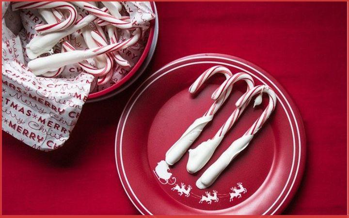 peppermint candy cane on a red plate