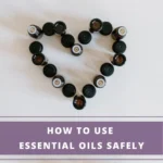 essential oil bottles placed in heart shape on surface