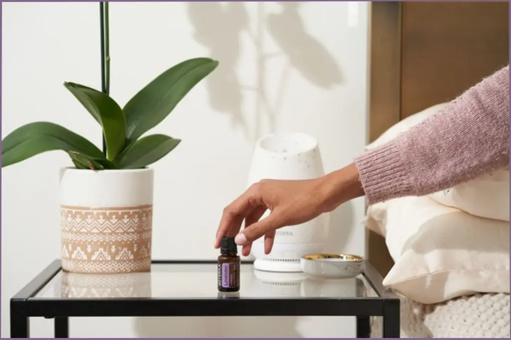 lady using lavender essential oil at bedtime