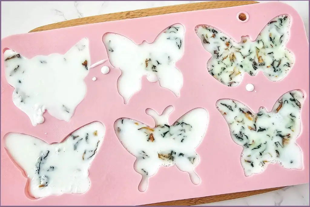 pink butterfly shaped soap mold for making shea butter soap