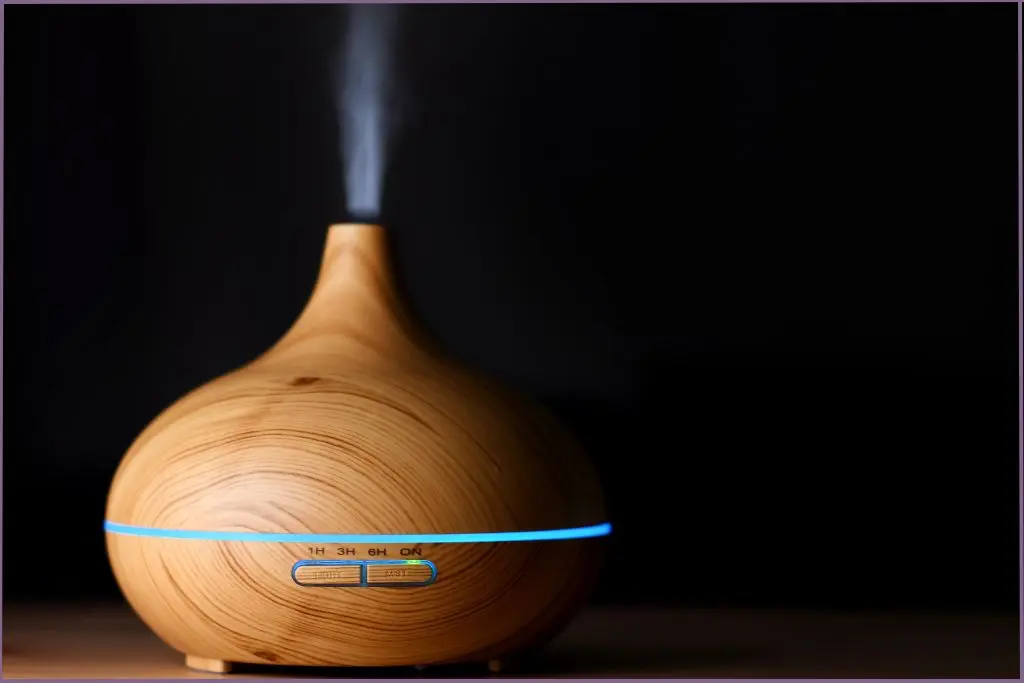 woodgrain aromatherapy diffuser on black ground