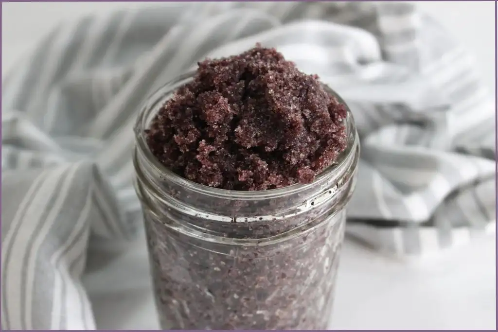 glass jar with homemade hibiscus sugar scrub