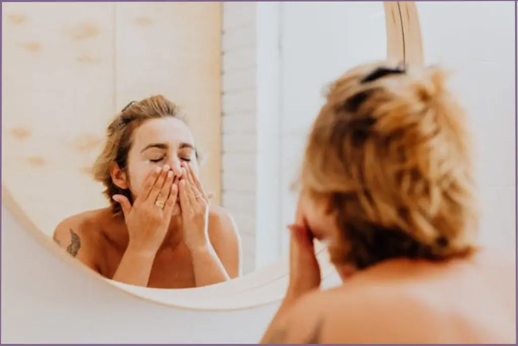 lady washing her face with homemade face wash