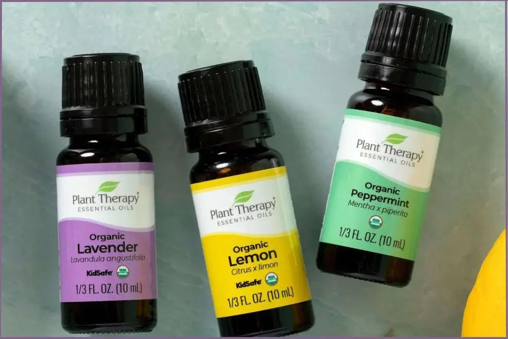 bottles of lavender, lemon, and peppermint essential oils