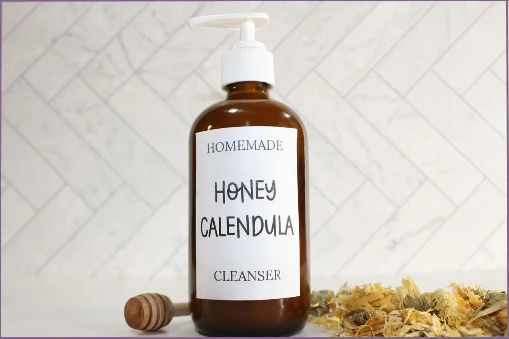 glass pump bottle with homemade honey calendula face wash