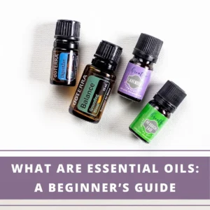 4 essential oil bottles -on white background