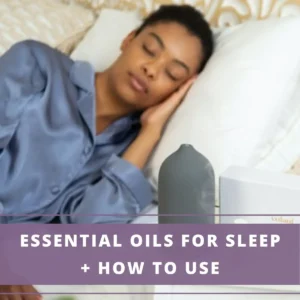 lady asleep with aromatherapy on table - best essential oils for sleep