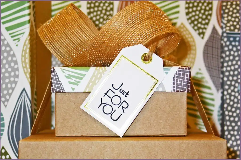 brown box converted into a gift basket with big bow and a label saying 'just for you'