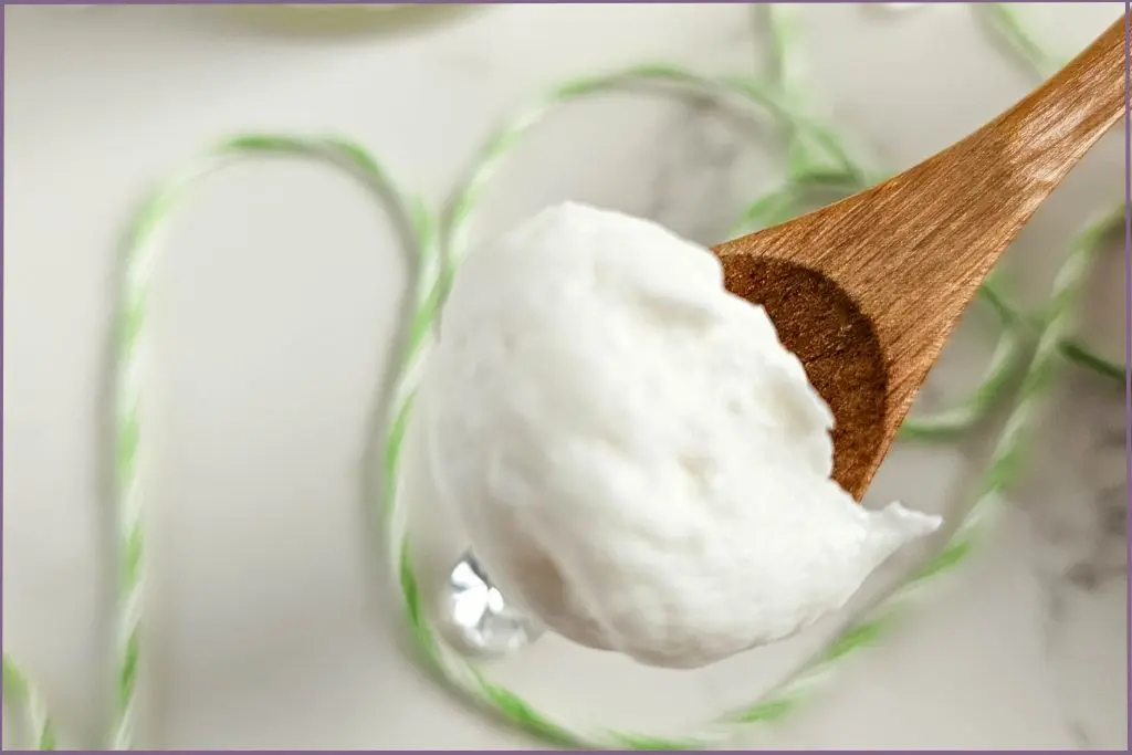 wooden spatula with homemade whipped body butter