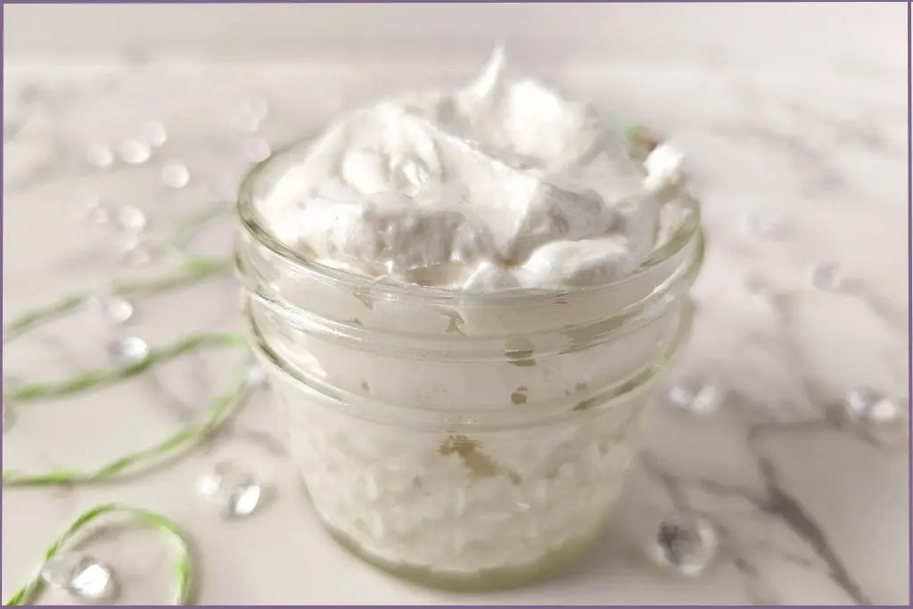 glass jar with homemade whipped body butter