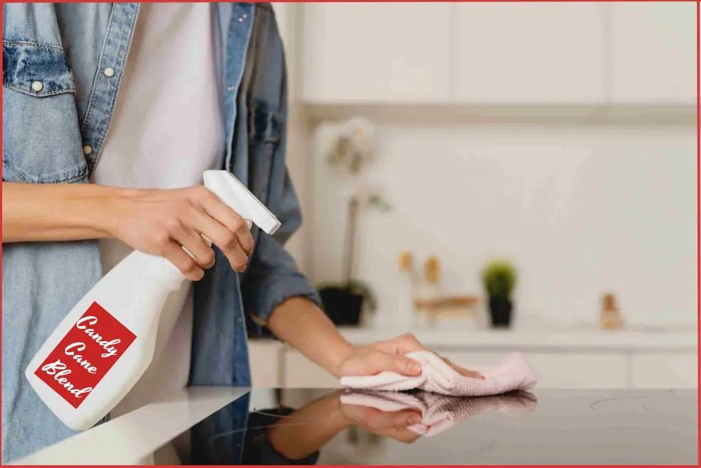 lady spray cleaning surface