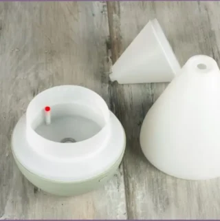 an opened up essential oil diffuser for cleaning