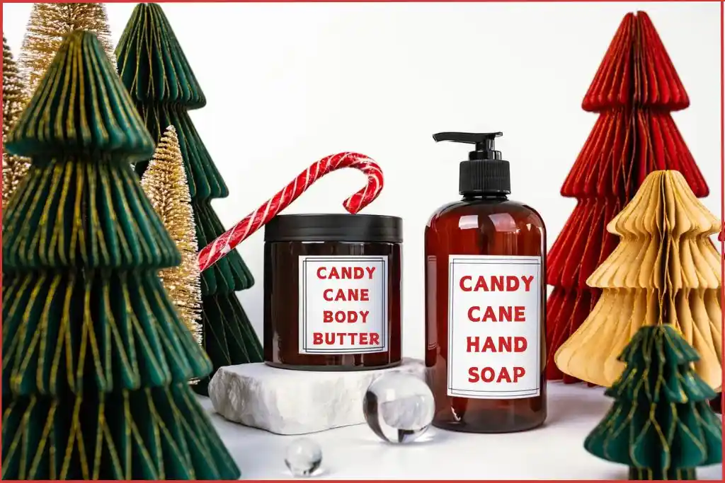 bottles of homemade soap and body butter in Christmas scent