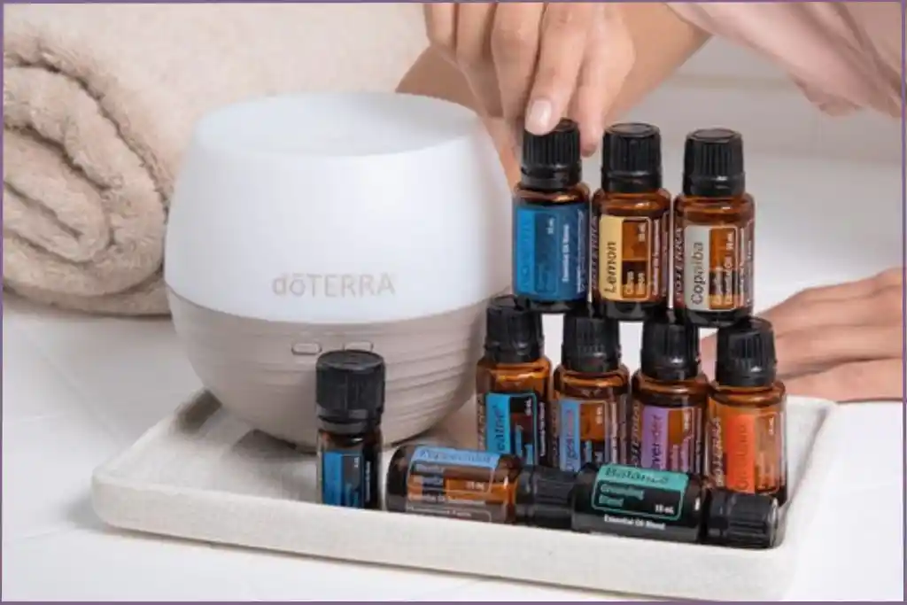 essential oil bottles + diffuser - What is aromatherapy