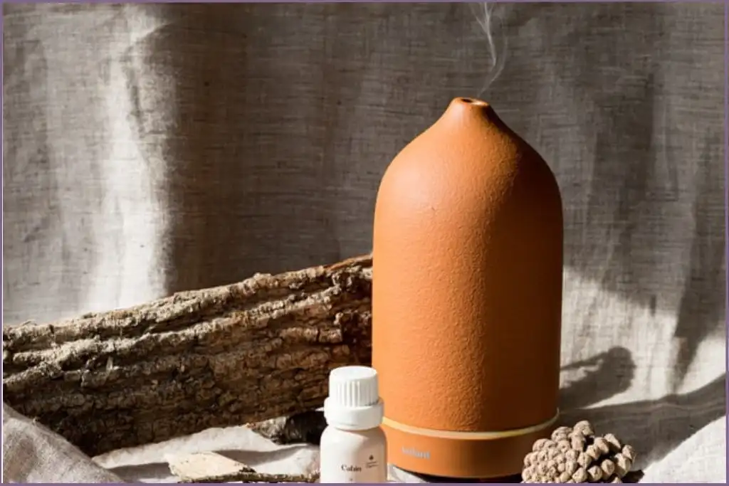 brown aromatherapy diffuser with cedarwood essential oil blend