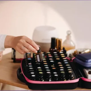 Assorted essential oil bottles in a case - how to use essential oils for aromatherapy