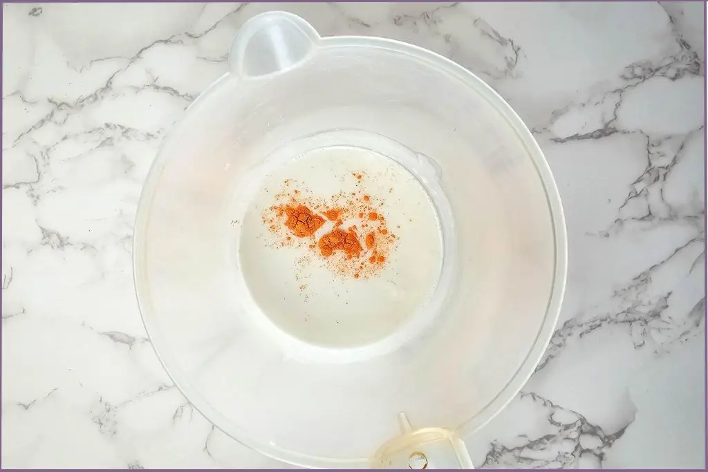 Orange mica color in melted soap base to make Halloween melt and pour soap bars