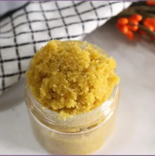glass jar with DIY pumpkin spice body scrub