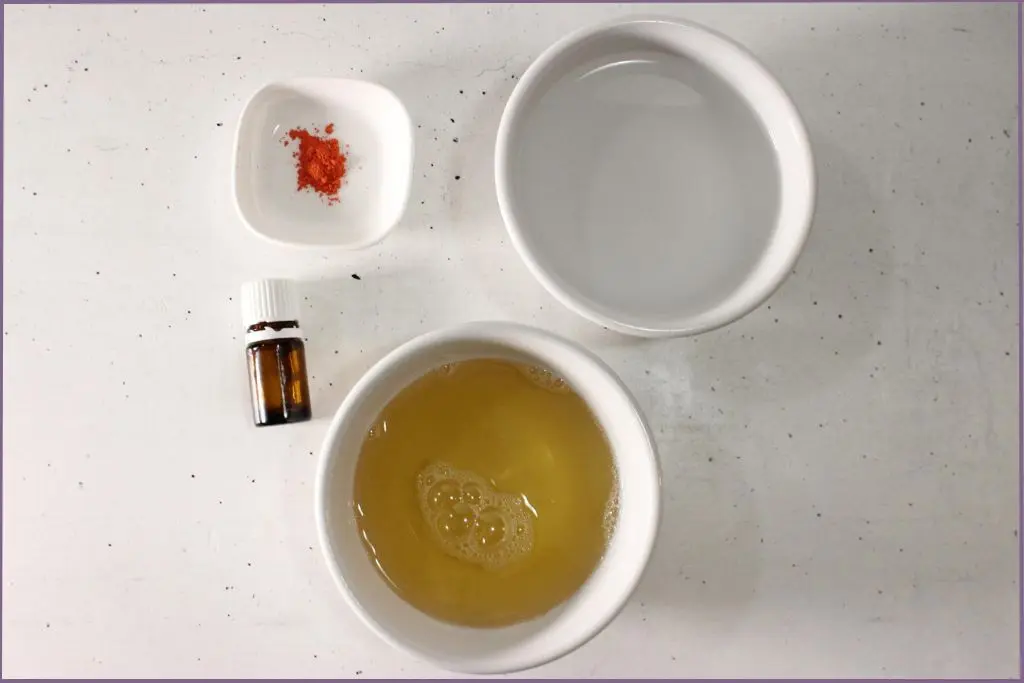 Ingredients for Fall foaming hand soap recipe - castile soap, water, essential oil and orange mica color