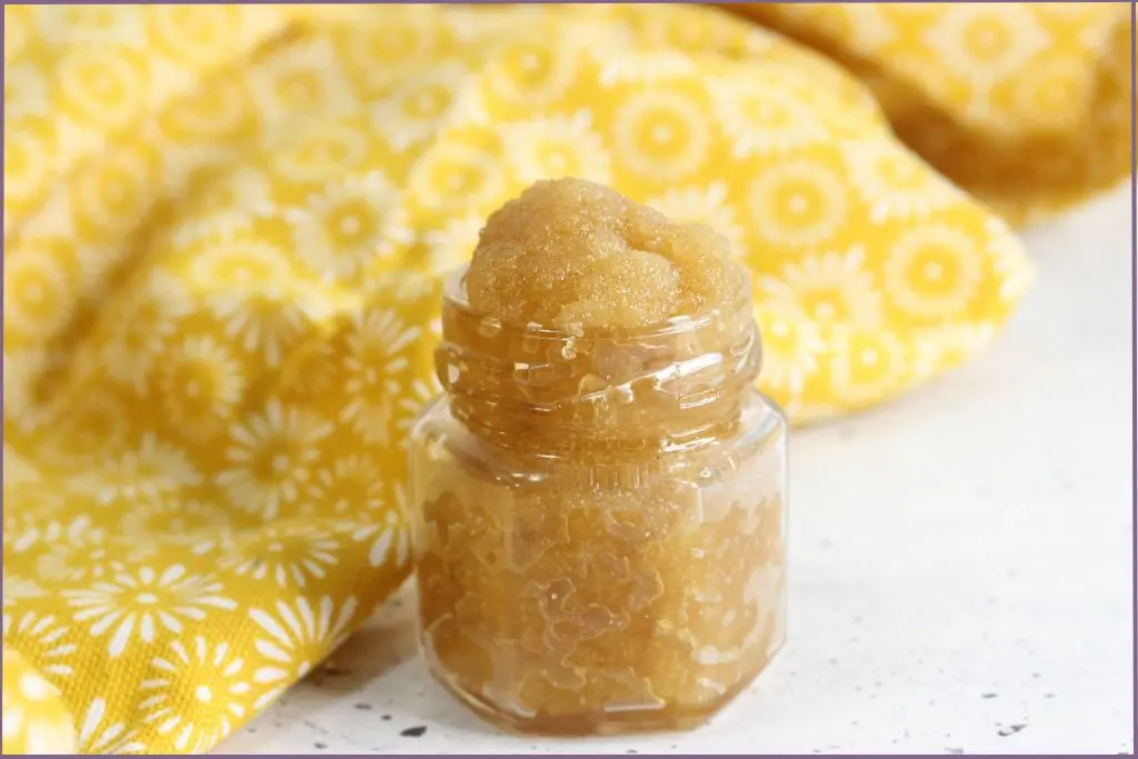 Homemade honey lip scrub in a glass bottle - ideas to customize the recipe