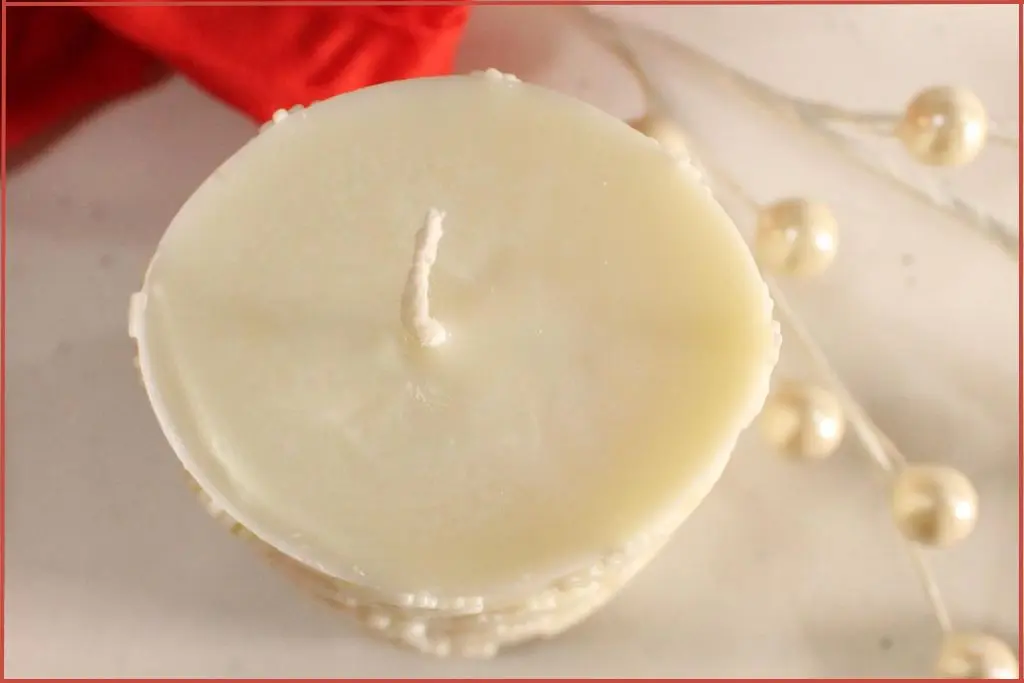 Top view of homemade white snowflake candle