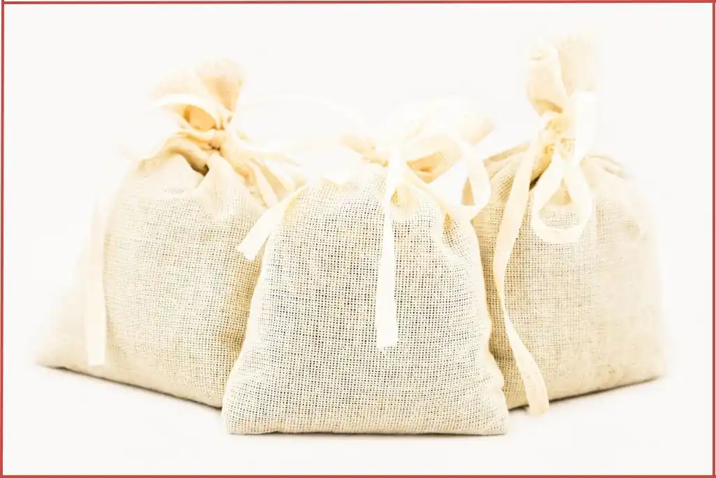 3 ecru fabric pouches to use as scented sachets in closets and drawers